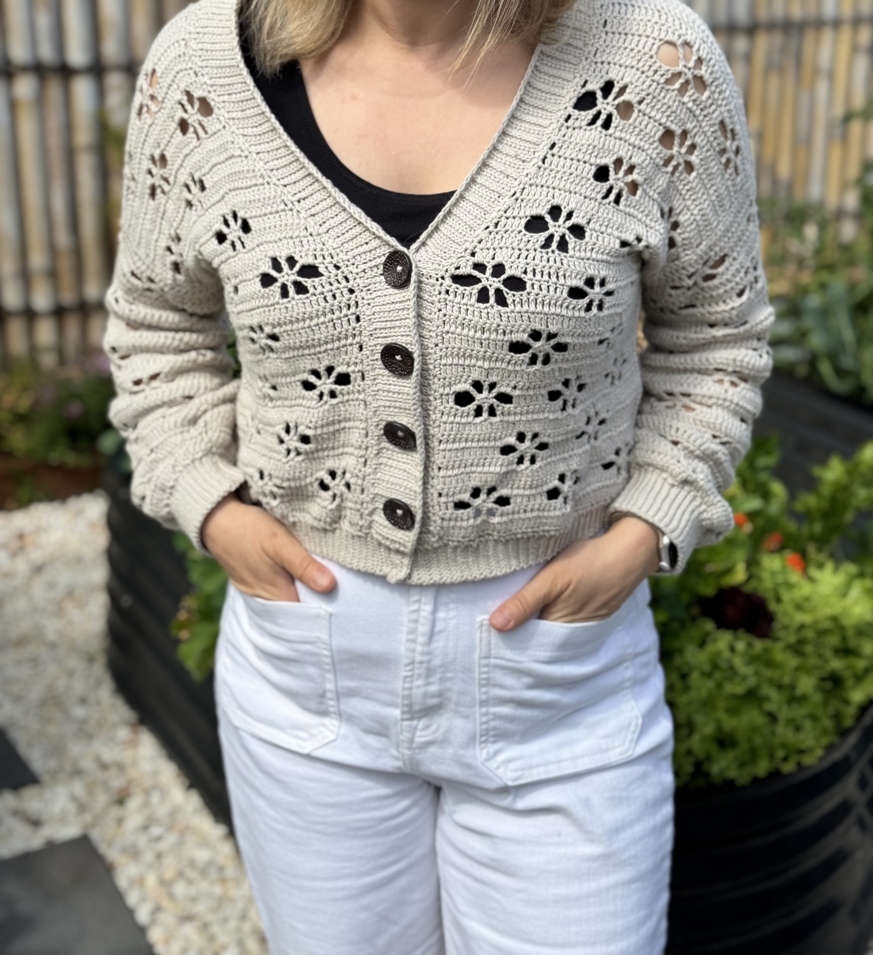 Juli wearing a handmade cardigan